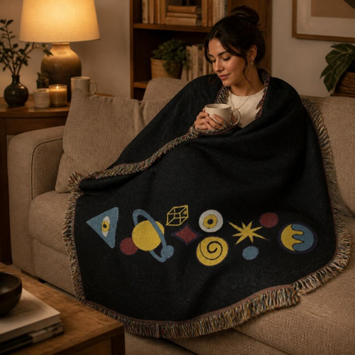 Model wrapped in the Celestial Woven Blanket